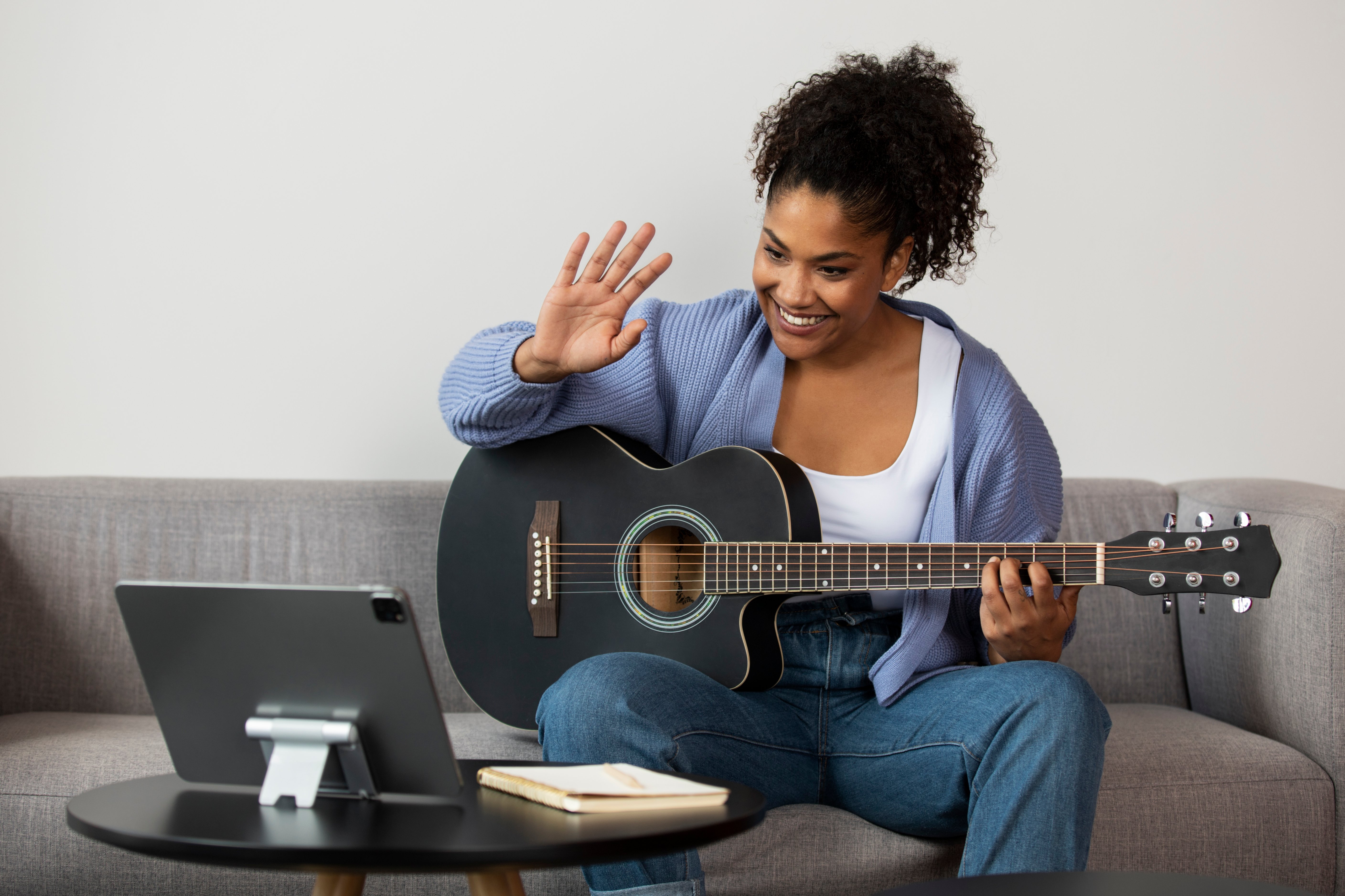 Woman during online music lesson